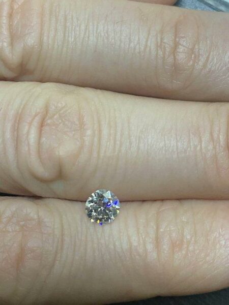 GIA Certified 0.66 Carat H SI1 Circular Brilliant Diamond - Image 2