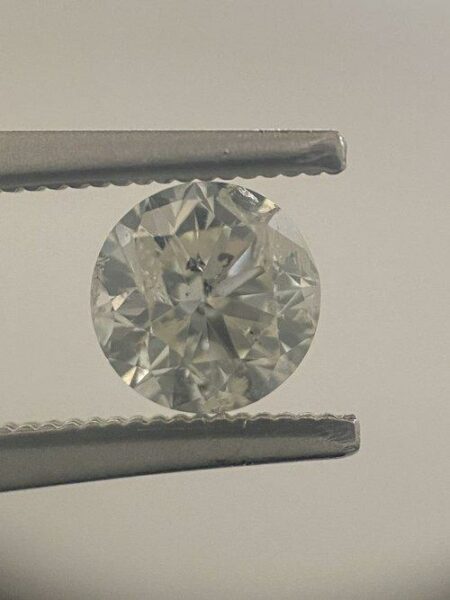 GIA Certified 0.71 Carat M I2 Round Brilliant Diamond - Image 3
