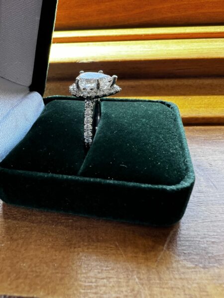 Lab Grown 2.02 f,vs2 IGI certified pear shaped diamond set in a halo style setting - Image 3