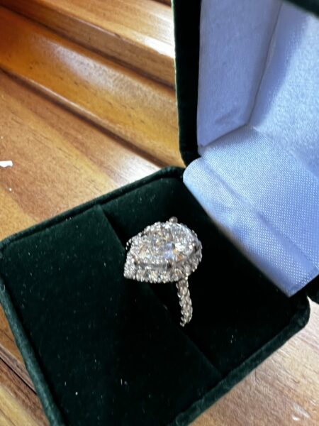 Lab Grown 2.02 f,vs2 IGI certified pear shaped diamond set in a halo style setting - Image 2