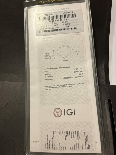 Never Worn IGI Certified 1.5 CT E Vs1  Oval Lab-Grown Diamond Center Stone in 14kt White Gold Ring - Image 4