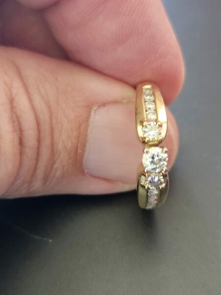 0.18 CT H/I I1 Round Cut Diamond with Two 0.18 TW H/I I1 Side Diamonds Yellow Gold Ring - Image 4