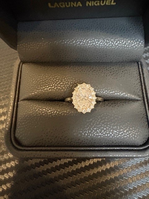 IGI 1.61 main diamond and .42 ct total surrounding diamonds on halo Carat D IF Oval Lab Grown Diamond Ring - Image 1